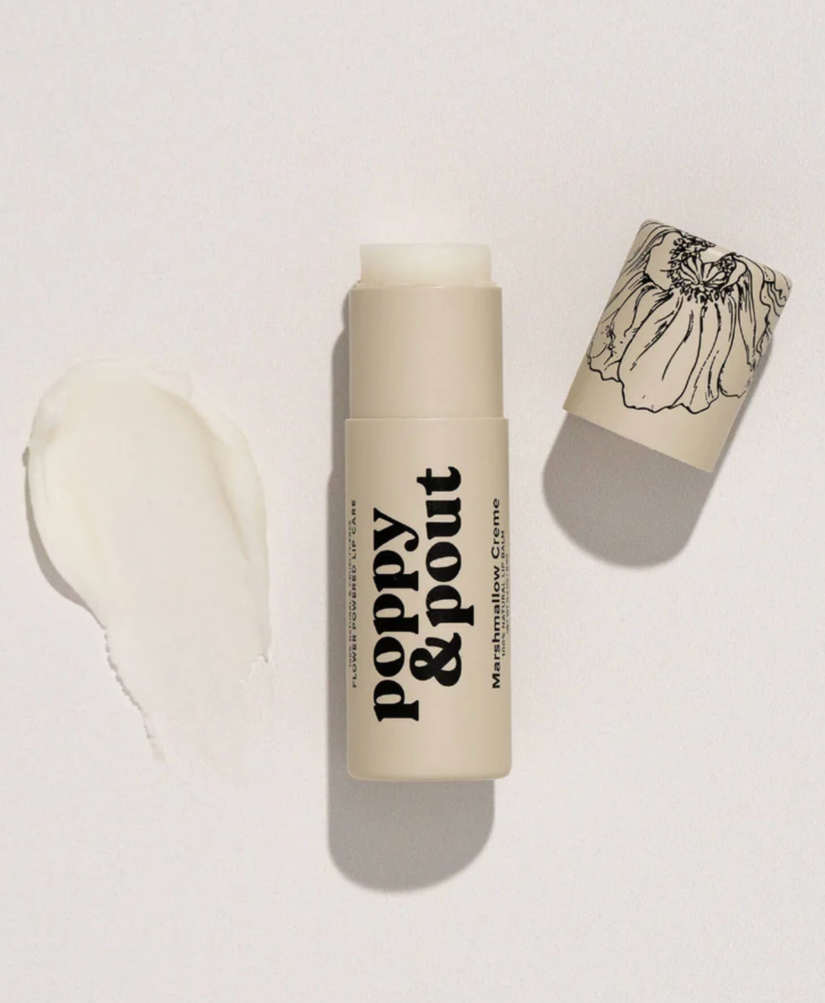 Poppy & Pout lip balm on a white background